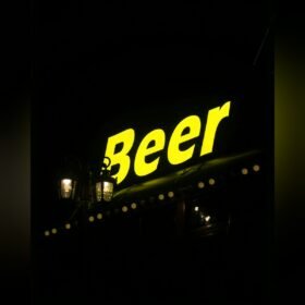 Rimless front lit letters glowing yellow