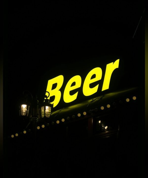 Rimless front lit letters glowing yellow