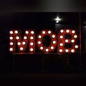 Letters with rows of light holes