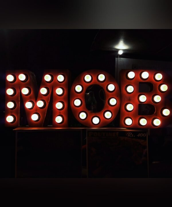 Letters with rows of light holes