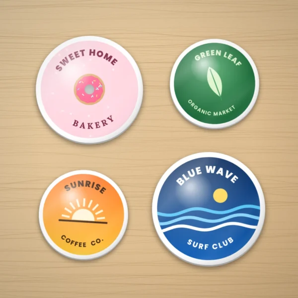 Domed epoxy stickers on a wooden desk